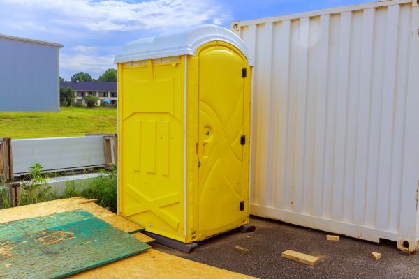 Porta potty rental company units staged for delivery in South Florida